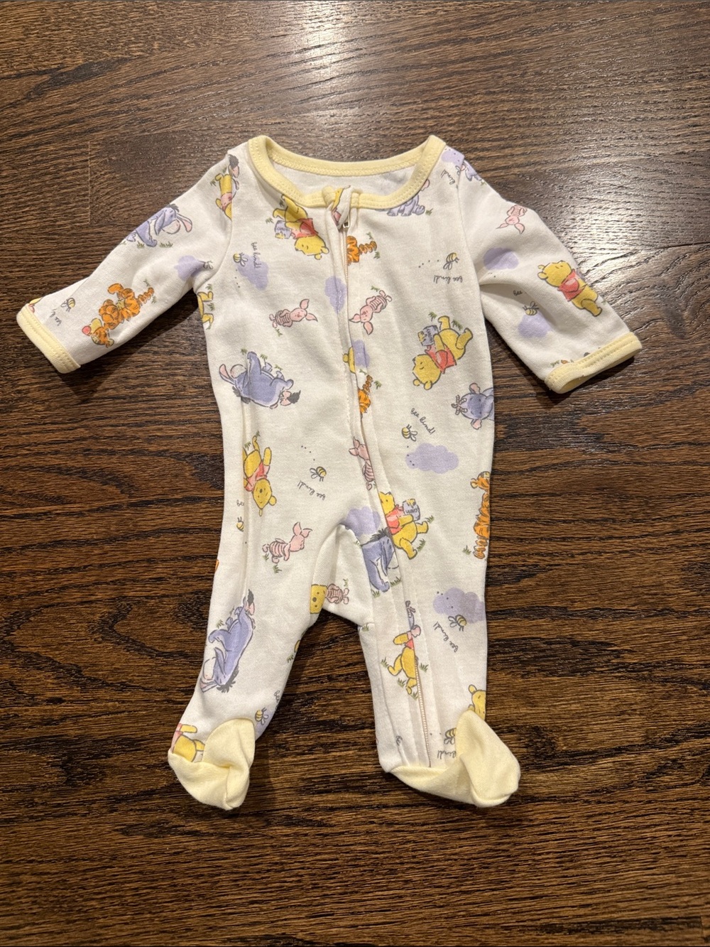 Disney premiere Cream Winnie the Pooh & Friends Footed One-Piece